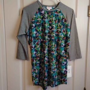 LuLaRoe Disney print Randy shirt, Size Small see pics for measurements. (J-86)